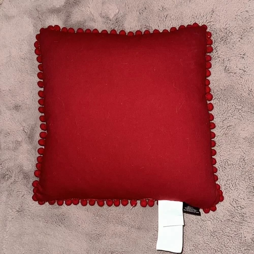 NWT Kirkland’s Red and Green Silent Night Pom Pom Pillow